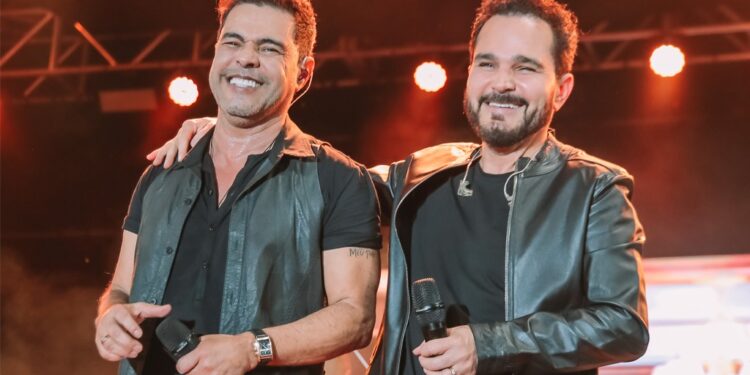 Nem a chuva apagou a emoção: Zezé Di Camargo e Luciano lotam arena na terceira noite da Expoacre 2025